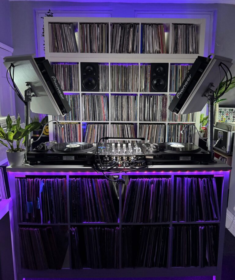 DJ booth with turntables and record shelves at Drop Studios, Long Buckby