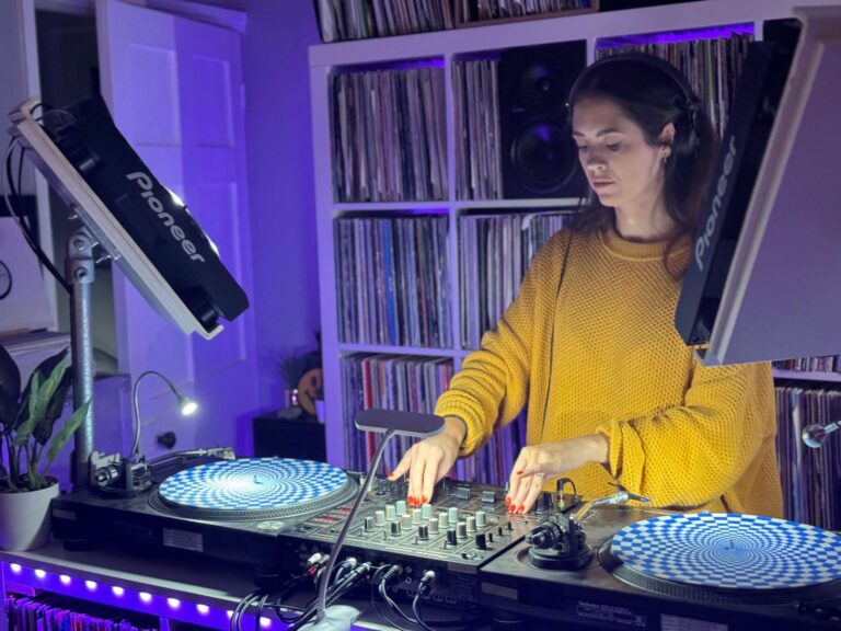 DJ practising on the decks at Drop Studios DJ practice studio